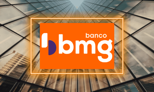 Prédios e logotipo do banco BMG contornado de neon laranja.