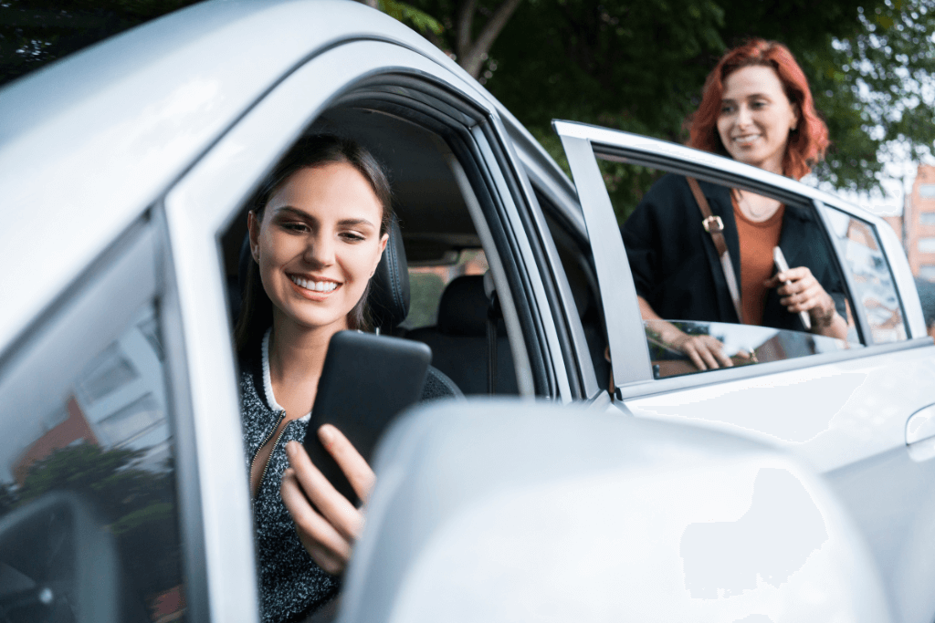 Motorista de Uber buscando uma passageira.