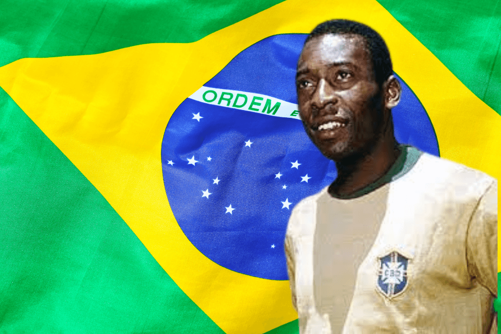 Pelé na juventude, com o uniforme da seleção brasileira, com a bandeira do Brasil ao fundo.