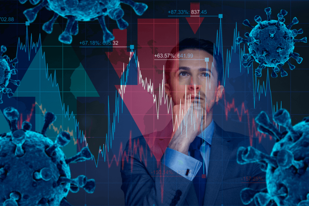 Homem olhando números na bolsa de valores, com imagens do coronavírus espalhadas em tela.