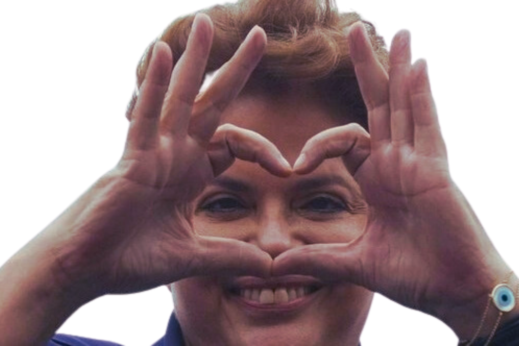 Dilma Rousseff fazendo um coração com as mãos.